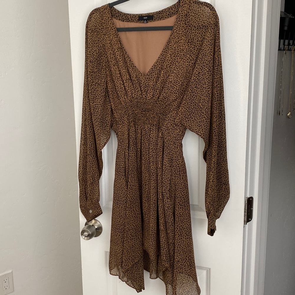 Brand new never been worn animal print FATE dress. Size small.